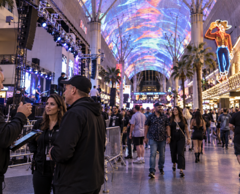 Editorial illustration of a downtown Las Vegas event program and Fremont Street lights